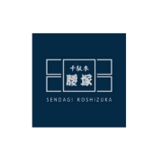 千駄木腰塚 のロゴ